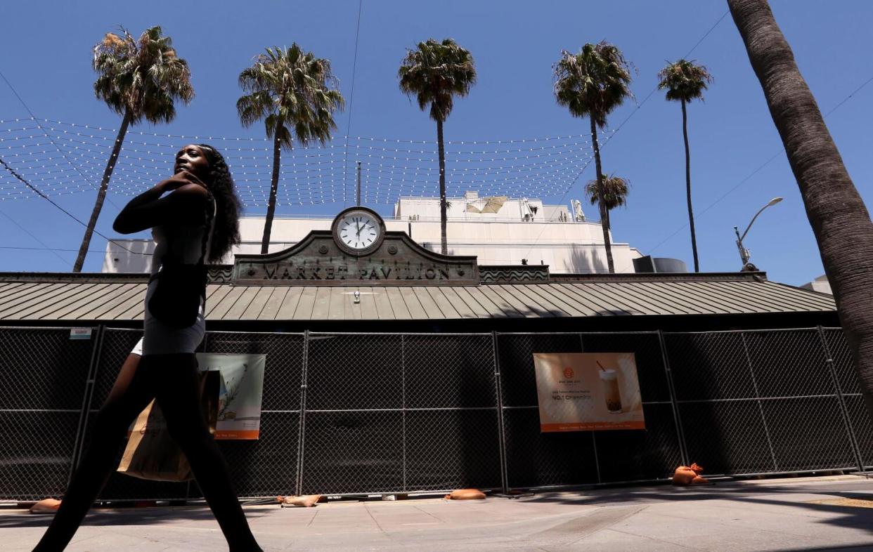 People walk in the Third Street Promenade.