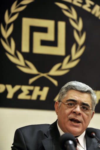 Political leader of the far-right party 'Golden Dawn', Nikolaos Michaloliakos speaks during a press conference at an hotel in Athens. Greek voters dealt a blow to eurozone hopes that Athens will stick to its austerity commitments as parties opposing more cuts, including neo-Nazis, won almost 60-percent support in an election Sunday