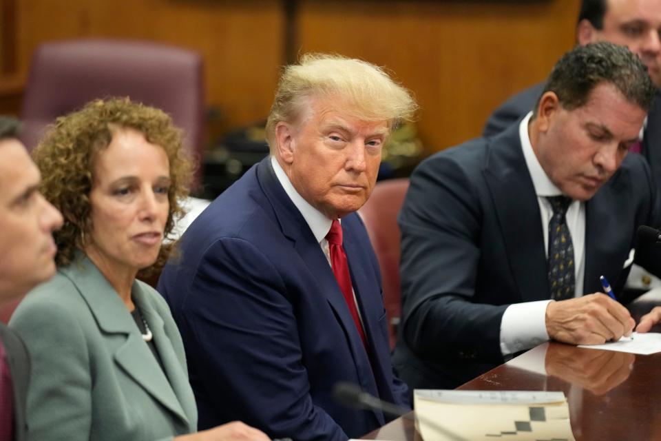 Former President Donald Trump appears in court for arraignment before Judge Juan Merchan following his surrender to New York authorities at the New York County Criminal Court on April 4, 2023. Trump appeared in court to answer charges from a grand jury investigation into payments made during the 2016 campaign to bury allegations of extramarital sexual encounters.