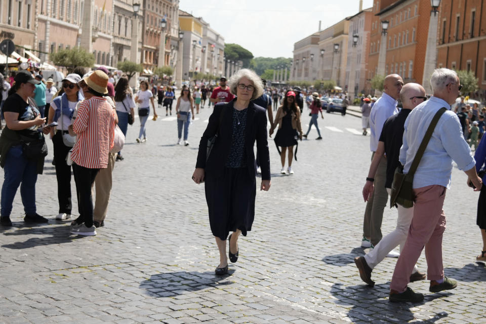 Sister Nathalie Becquart, the first female undersecretary in the Vatican's Synod of Bishops, walks on her way to the Vatican, Monday, May 29, 2023. Becquart is charting the global church through an unprecedented, and even stormy, period of reform as one of the highest-ranking women at the Vatican. (AP Photo/Alessandra Tarantino)
