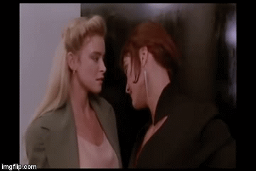 Two women from "Deep Impact" flirt.