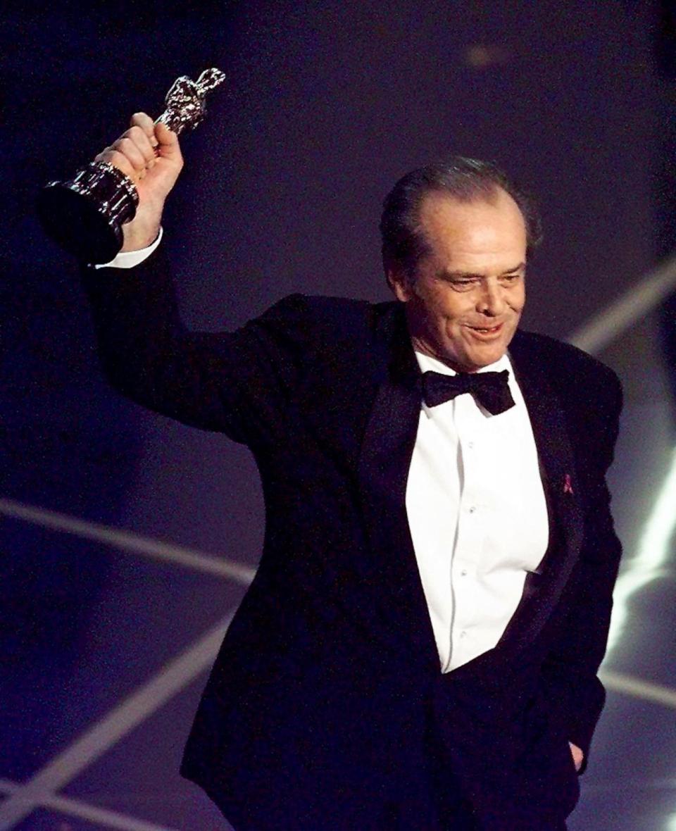 PHOTO: Jack Nicholson holds up his Oscar after winning the Best Actor in a Leading Role Category during the 70th Academy Awards at the Shrine Auditorium March, 23, 1998. Nicholson won for his role in the movie 'As Good as it Gets'.     (Timothy A. Clary/AFP via Getty Images, FILE)