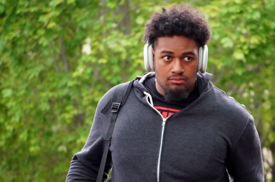 Ohio State football offensive lineman Josh Simmons checks into the team's hotel for fall camp in Grandview, Ohio, on Aug. 7, 2023.