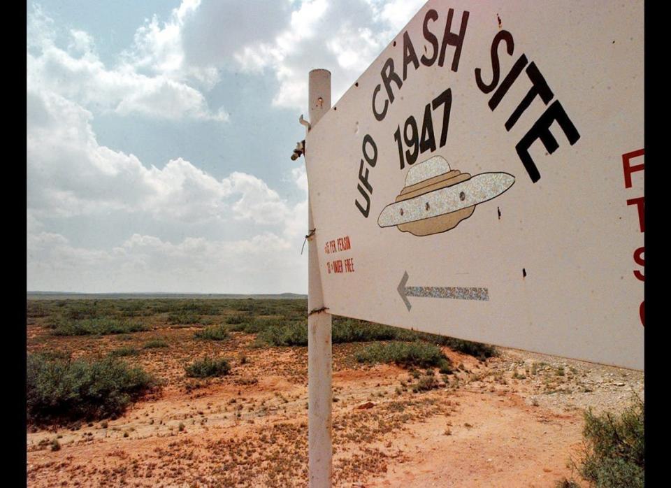 A sign directs travelers to the start of the "1947 UFO Crash Site Tours" in Roswell, N.M., June 10, 1997. In Roswell, locals don't argue anymore about whether a space ship crashed nearby. They argue about whose ranch it landed on.