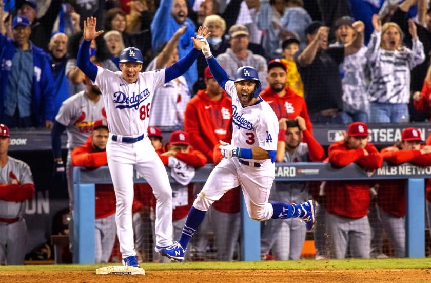 LOS ANGELES, CA - OCTOBER 6, 2021: Los Angeles Dodgers left fielder Chris Taylor (3) reacts while running the bases after his 2-run homer wins the game against the St Louis Cardinals in the National League Wild Card game at Dodger Stadium on October 6, 2021 in Los Angeles, California.(Gina Ferazzi / Los Angeles Times)