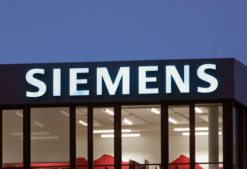 The logo of German industrial group Siemens is seen in Zug