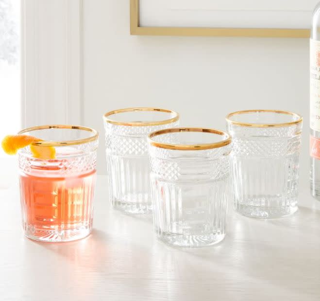 These glasses have etched detailing and a gold rim. Find them for $50 at <a href="https://fave.co/3iXPQNK" target="_blank" rel="noopener noreferrer">West Elm</a>.