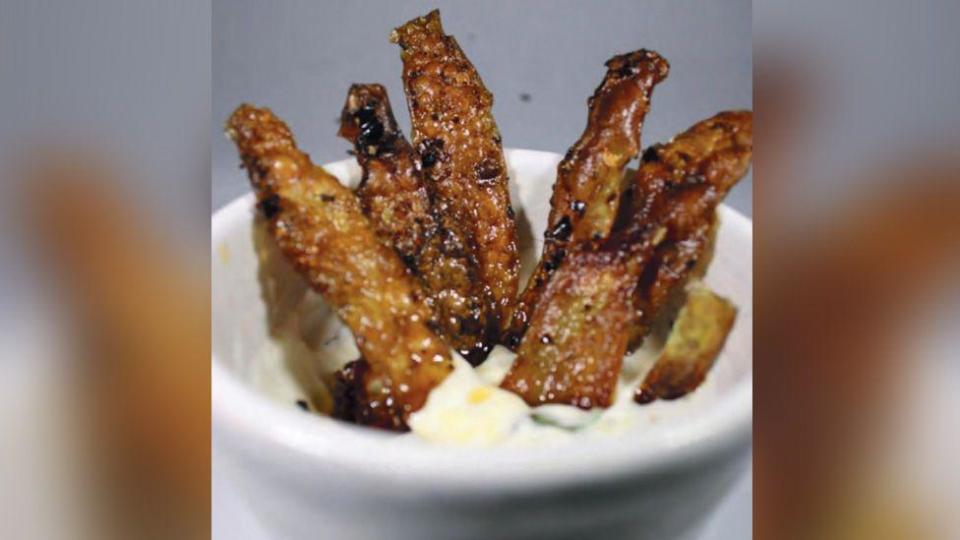 Crisps made from potato skin dipped in a mayonnaise pot