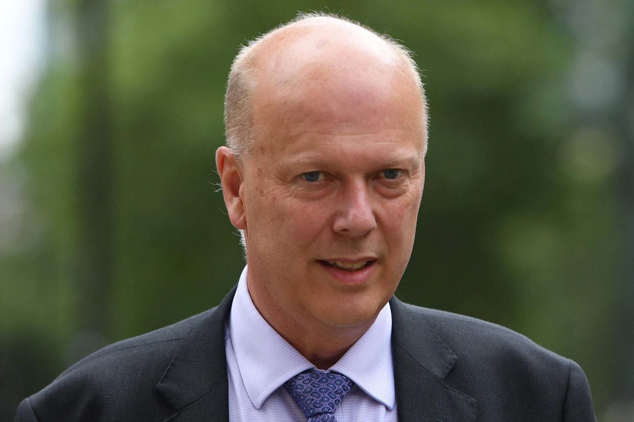 Former minister Chris Grayling: AFP via Getty Images