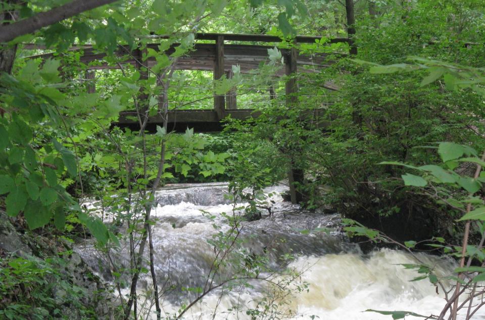 This undated photo supplied by Portland Trails shows Jewell Falls and the Fore River headwater bridge in the Fore River Sanctuary, a scenic spot that’s part of 40 miles of free trails in Greater Portland, Maine. Portland Trails is a nonprofit trust that preserves green space for the public, and exploring the trails is just one of a number of free things visitors can do in and around Maine’s largest city. (AP Photo/Portland Trails, Tom Jewell)