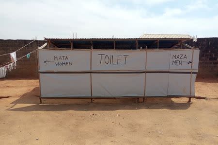 A sign for toilets at Riyom IDP camp, housing families who escaped the violence between herders and farming communities, in Plateau State, Nigeria November 19, 2018. Picture taken November 19, 2018. REUTERS/Inusa Joshua