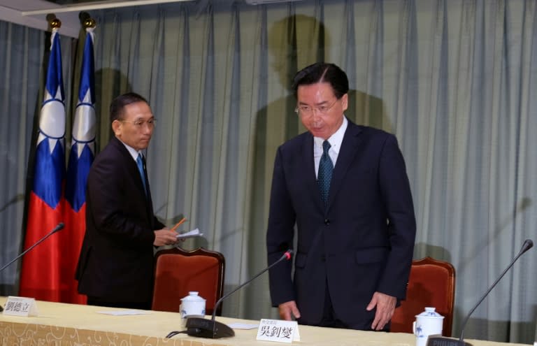 Speaking in Taipei, foreign minister Joseph Wu, right, condemned China's "crude actions"