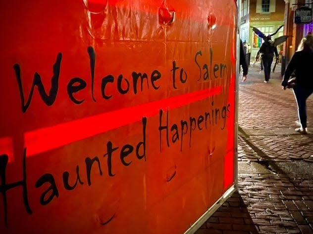 Haunted Happenings banner as you walk into the heart of downtown