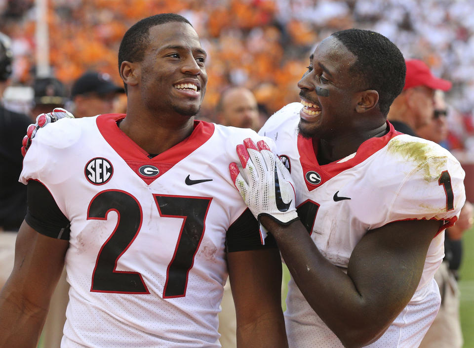 If not for the decisions by tailbacks Nick Chubb (L) and Sony Michel to return for their senior seasons, Georgia almost assuredly wouldn’t have made the College Football Playoff. (AP)