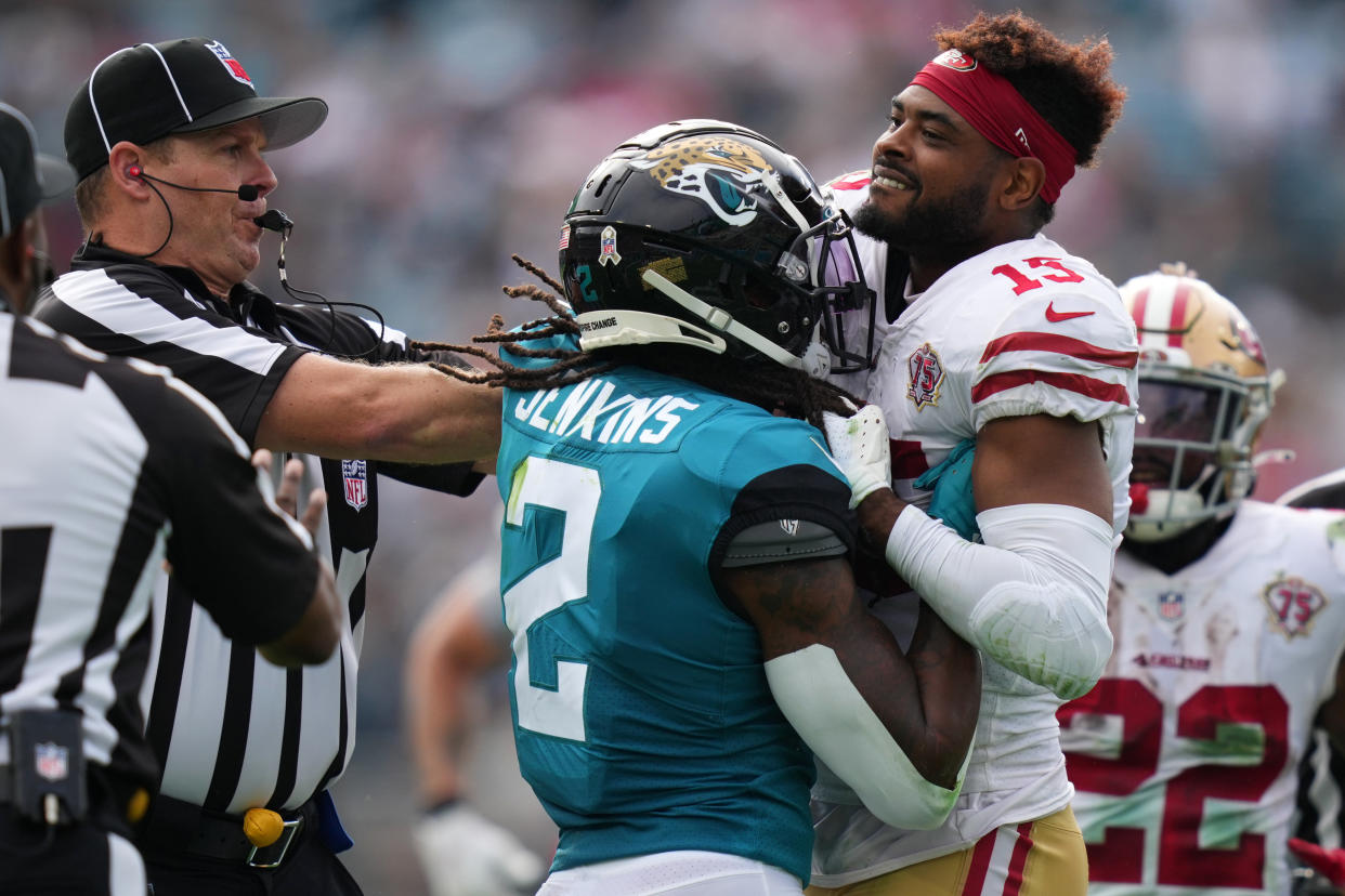 Nov 21, 2021; Jacksonville, Florida, USA; Jacksonville Jaguars free safety Rayshawn Jenkins (2) fights with San Francisco 49ers wide receiver Jauan Jennings (15), Jenkins would be disqualified from the game from a personal foul penalty during the first half at TIAA Bank Field. Mandatory Credit: Jasen Vinlove-USA TODAY Sports