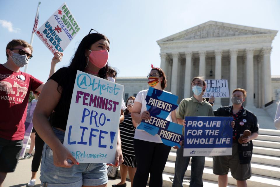 Abortion opponents demonstrate in front of the Supreme Court in June, when the justices ruled 5-4 against a Louisiana law imposing restrictions on abortion clinics and doctors.