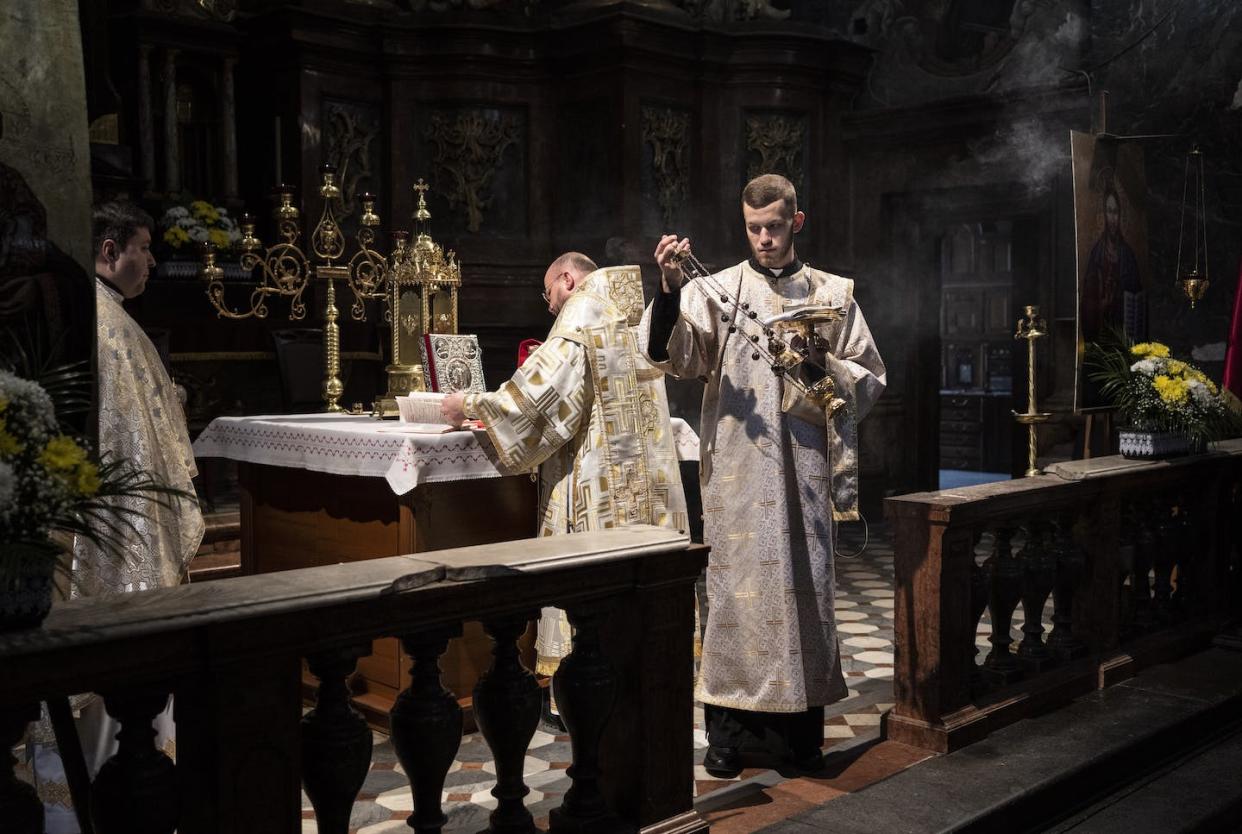 Ukrainian Greek Catholic priests celebrating Sunday Mass in Lviv, in western Ukraine. <a href="https://newsroom.ap.org/detail/RussiaUkraineWar/4f665e91443f4c4da90c53cc66cee035/photo?Query=Ukrainian%20Greek%20Catholic%20Church%20lviv&mediaType=photo&sortBy=&dateRange=Anytime&totalCount=6&currentItemNo=3" rel="nofollow noopener" target="_blank" data-ylk="slk:AP Photo/Bernat Armangue;elm:context_link;itc:0;sec:content-canvas" class="link ">AP Photo/Bernat Armangue</a>