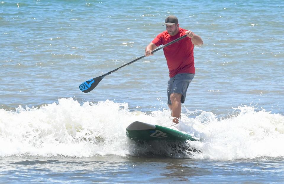 Ronny Wharton in the paddleboard competition at the 19th Annual Waterman's Challenge in 2019.