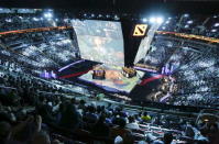 Fans watch a competition during The International Dota 2 Championships at Key Arena in Seattle, Washington August 8, 2015. REUTERS/Jason Redmond