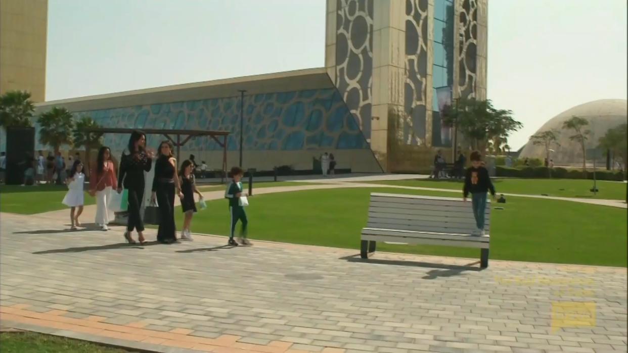 RHODubai Premiere - Sara Al Madani and Nina Ali with their children at the Dubai Frame during the premiere (Bravo)