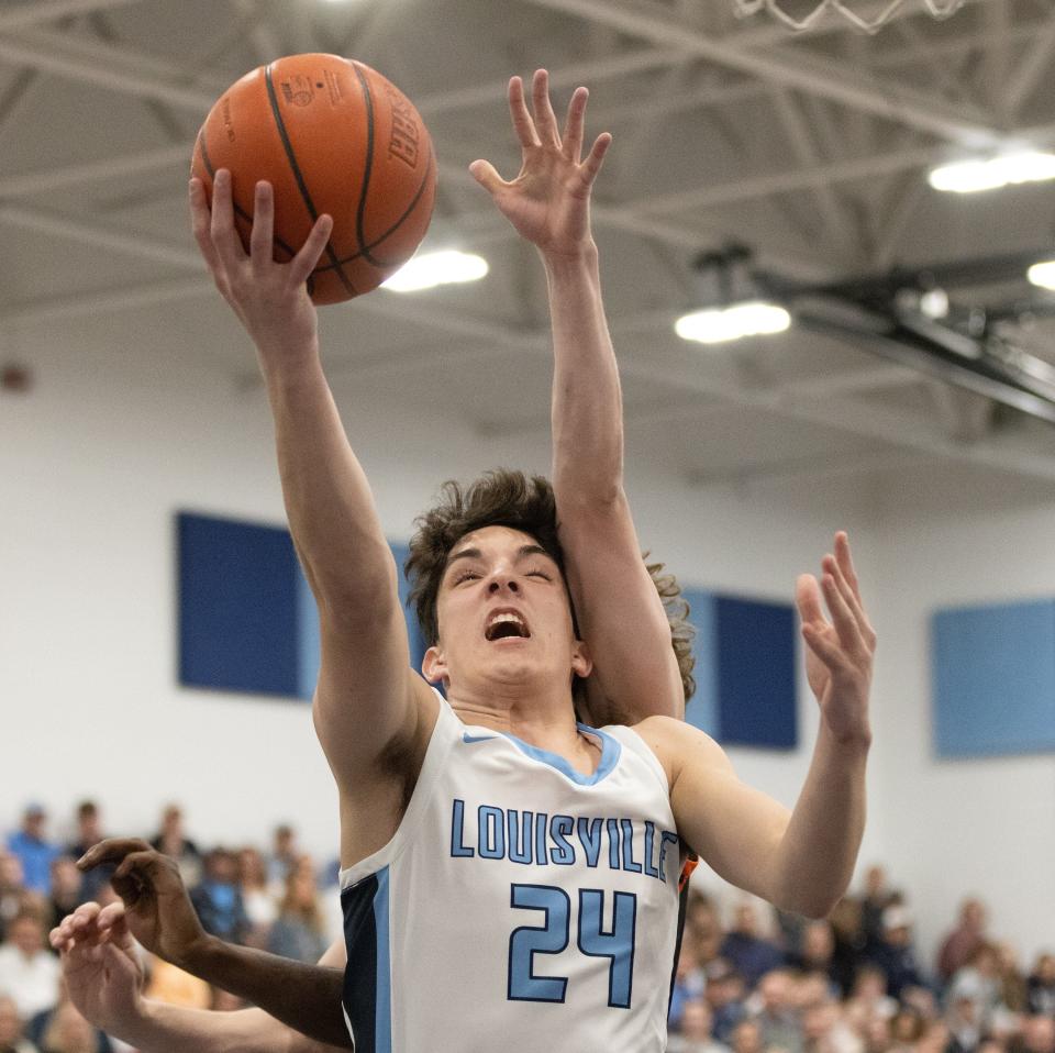 Louisville’s Hayden Nigro, in action last month against Massillon, became his school's career scoring leader in a sectional final win over Firestone.