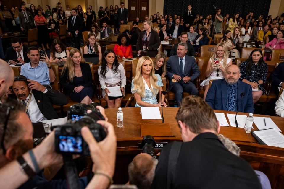 Paris Hilton attends a House Committee on Ways and Means hearing on Wednesday. The heiress previously testified to Congress in 2021, advocating for a “Bill of Rights” for kids in residential facilities (Getty Images)