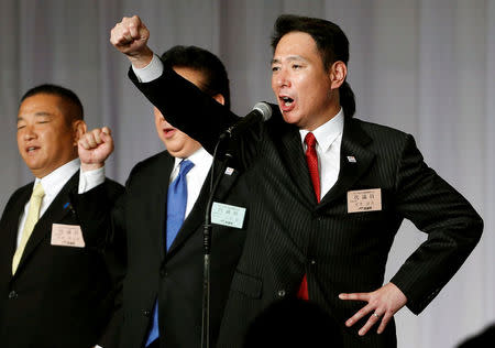 Japan's former Foreign Minister Seiji Maehara raises his fists with his party lawmakers after he was elected as the leader of Japan's main opposition party, the Democratic Party, during the party plenary meeting in Tokyo, Japan September 1, 2017. REUTERS/Toru Hanai