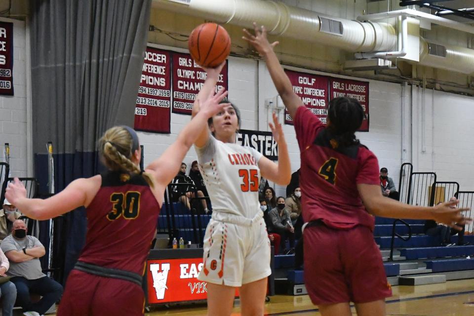 Cherokee senior Bri Wegner shoots over Haddon Hieghts junior Madison Clark and senior Marquae Rischardson-Muse