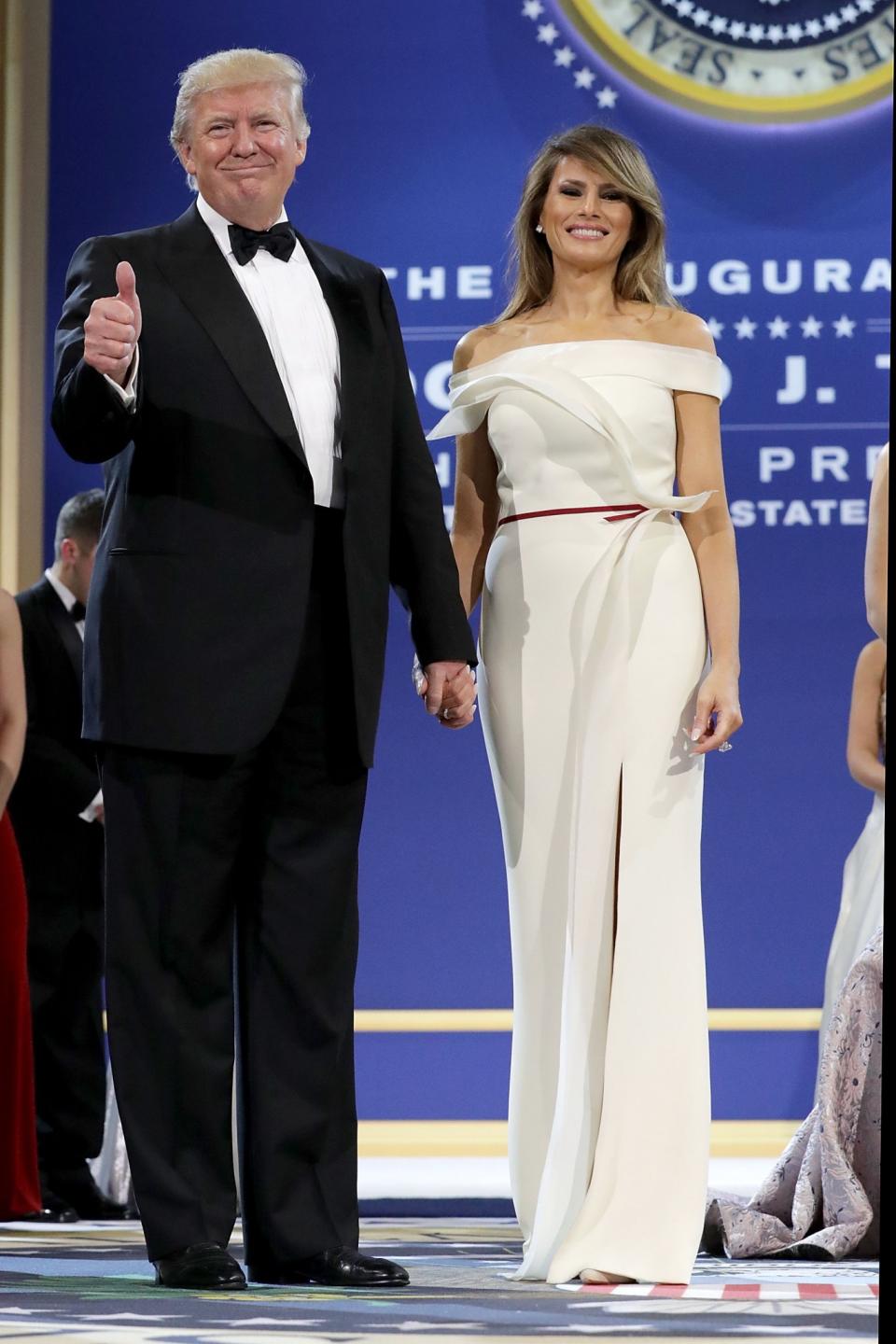 <p>Melania was a co-designer of this ivory off-the-shoulder gown. She enlisted the help of former Carolina Herrera creative director, Herve Pierre, to produce the simple design. <i>[Photo: Getty]</i> </p>