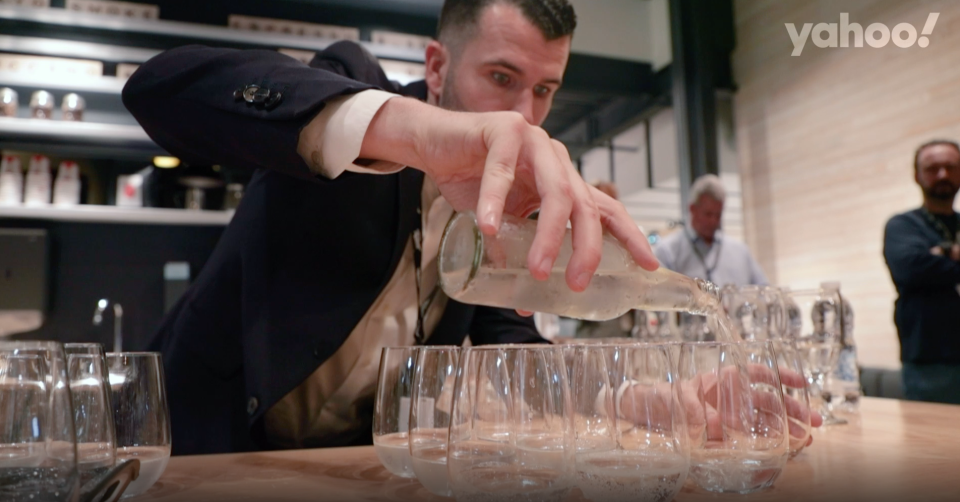 A Canopy Growth employee pours samples of non-infused cannabis drinks ahead at a tasting even on Oct. 29, 2019. (Yahoo Finance Canada)