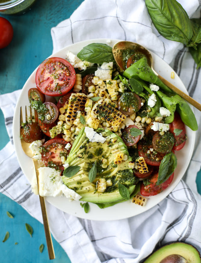 <strong>Get the <a href="http://www.howsweeteats.com/2017/06/grilled-corn-tomato-avocado-salad-chimichurri/" target="_blank">Grilled Corn, Tomato and Avocado Salad recipe</a>&nbsp;from How Sweet it Is</strong>