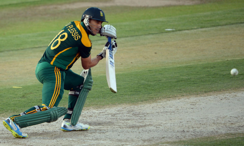 South African player Faf du Plessis looks at the ball after playing a shot during the fifth and final one-day against Pakistan at the Sharjah Cricket Stadium in Sharjah on November 11, 2013. South Africa are winning the five-match series with an unbeatable 3-1 lead. AFP PHOTO/ASIF HASSAN