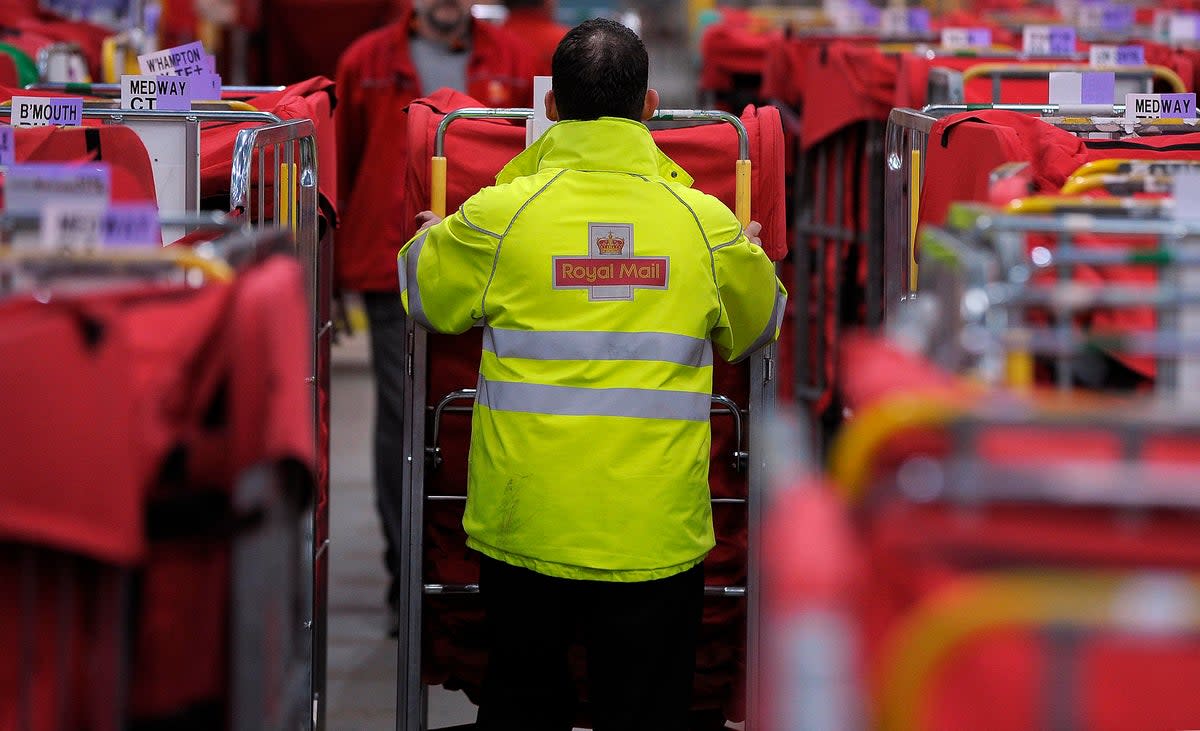 Royal Mail could stop postal deliveries on Saturdays under reforms to save money (AFP via Getty Images)