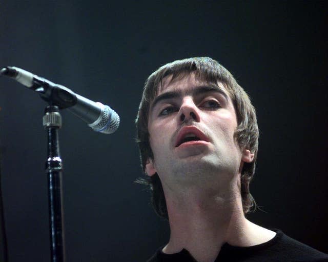 Liam Gallagher performing with Oasis