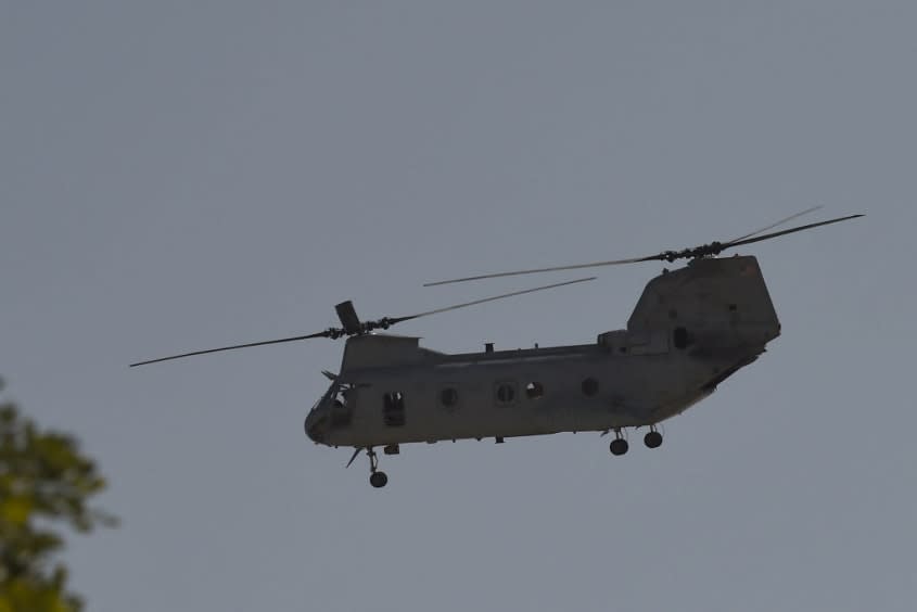 A US military helicopter is pictured flying near the US embassy in Kabul.