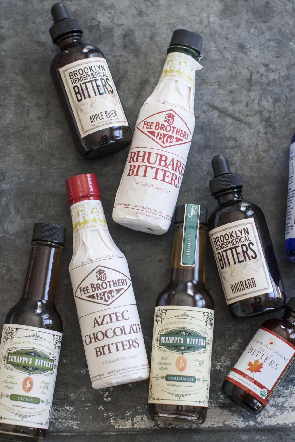 This Mar. 17, 2014 photo shows an assortment of cocktail bitters in Concord, N.H. (AP Photo/Matthew Mead)