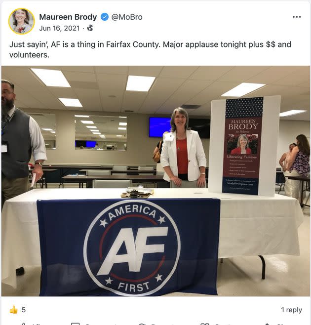 Maureen Brody, a 2021 Republican nominee for the Virginia House of Delegates, poses with a flag for the America First white nationalist movement. (Photo: Screenshot via Gab)