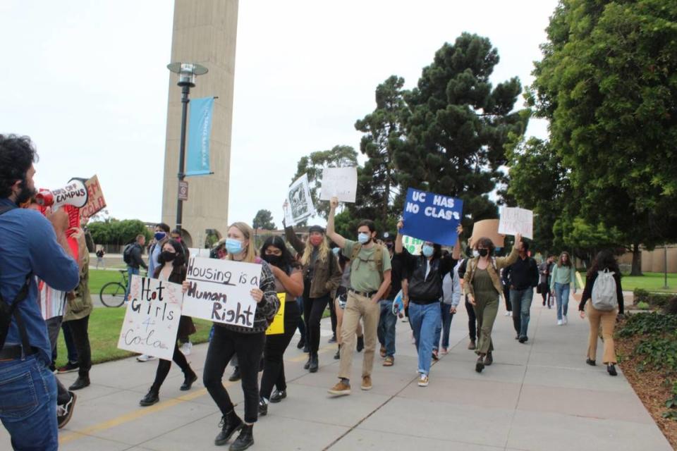 UC Santa Barbara students march from Stroke Tower to Cheadle Hall to demand that the university address its housing shortfall.