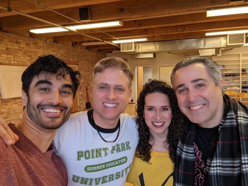 Actor Richard Bermudez, director-choreographer Gustavo Zajac, and actors Rána Roman (Eva Perón) and Andrew Varela pause for a group selfie during rehearsals for Skylight Music Theatre's "Evita."