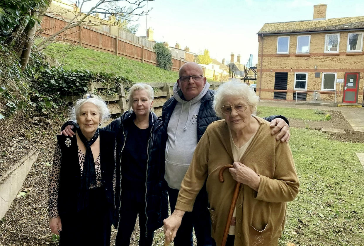 Gillian Davies (right) and her son Stephen Taylor with other residents. (SWNS)