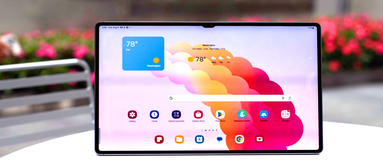  Samsung Galaxy Tab S9 Ultra showing home screen on white table 