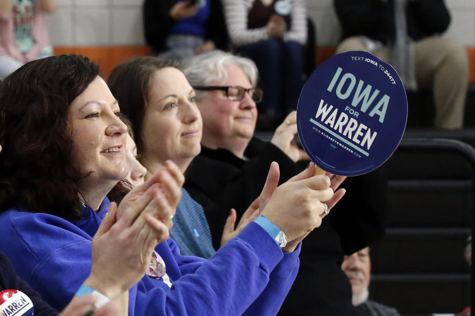 People applaud at a town hall meeting as they wait for Democratic presidential candidate Sen. Elizabeth Warren, D-Mass., to speak Sunday, Jan. 26, 2020, in Davenport, Iowa. (AP Photo/Sue Ogrocki)