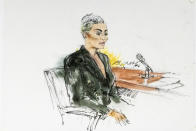 In this courtroom artist sketch, former reality television star Blac Chyna sits in court in Los Angeles, Tuesday, April 19, 2022. A jury has been seated in the trial that pits model and former reality television star Blac Chyna against the Kardashian family, who she alleges destroyed her TV career. (Bill Robles via AP)