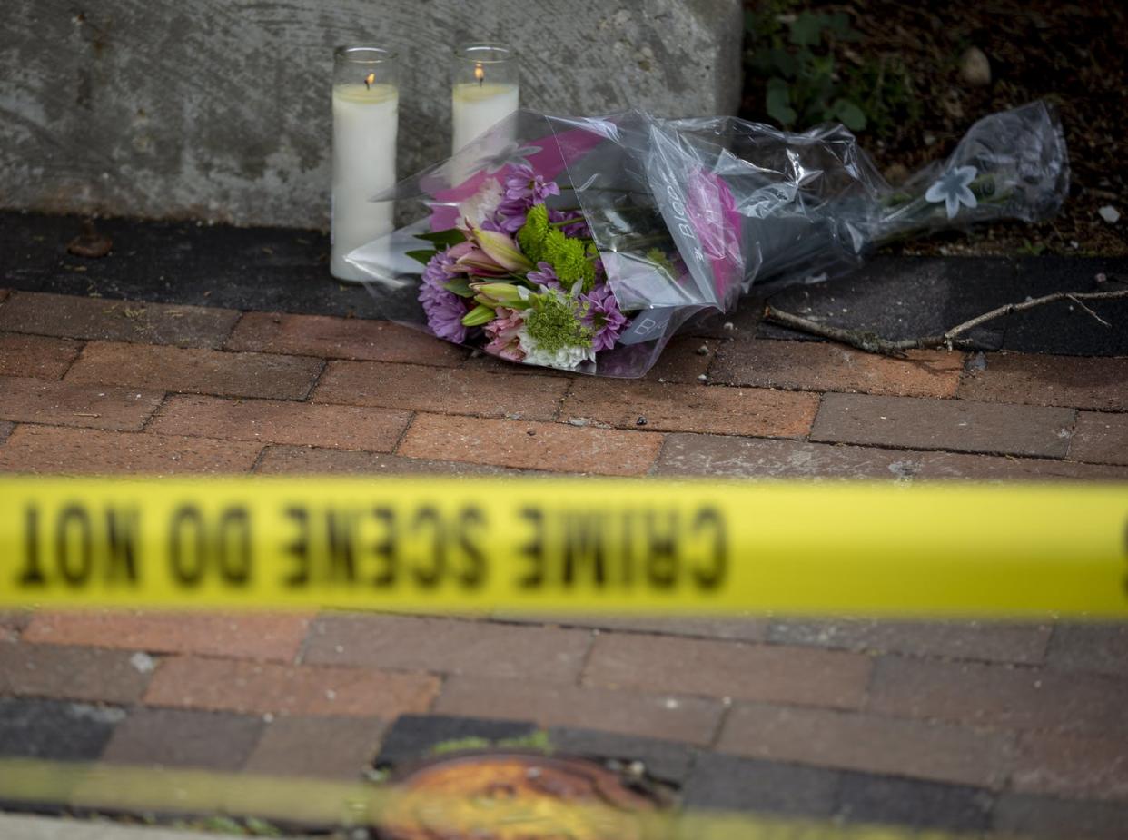 <span class="caption">Flowers are laid near the scene of a mass shooting during a Fourth of July parade in Highland Park, Ill.</span> <span class="attribution"><a class="link " href="https://www.gettyimages.com/detail/news-photo/flowers-are-laid-near-the-scene-of-a-shooting-at-a-fourth-news-photo/1241722394?adppopup=true" rel="nofollow noopener" target="_blank" data-ylk="slk:Jim Vondruska/Getty Images;elm:context_link;itc:0;sec:content-canvas">Jim Vondruska/Getty Images</a></span>