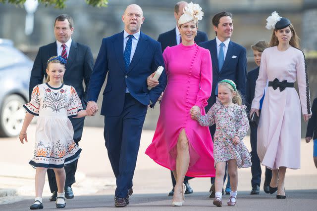 <p>Samir Hussein/WireImage</p> Mia Tindall, Peter Phillips, Mike Tindall, Zara Tindall, Edoardo Mapelli Mozzi, Lena Tindall and Princess Beatrice attend the Easter service at Windsor Castle in April 2023