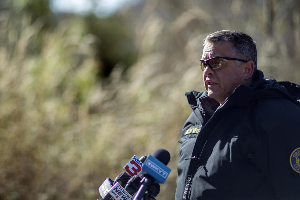 Lexington Fire Department Battalion Chief Chris Ward speaks to members of the media about the rescue operation underway for a worker trapped inside a collapsed coal preparation plant in Martin County, south of Inez, Ky., on Wednesday, Nov. 1, 2023. Officials said one worker died. (Ryan C. Hermens/Lexington Herald-Leader via AP)