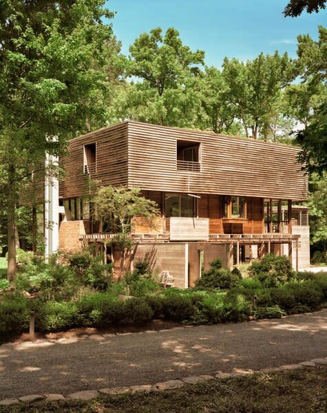 Architect Rick Cook imagined his ideal family home and then found something surprisingly similar for sale on a wooded two-acre lot in Palisades, New York. Cost, indecision, and the scale of the project, which included the original 4,000-square-foot home and a sizable addition, all slowed the pace, but so did the couple’s desire to honor the intent of the original architect, Charles P. Winter, who designed the house in 1972. 