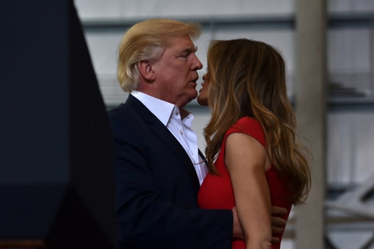 US President Donald Trump and First Lady Melania Trump arrive for a rally on February 18, 2017 in Melbourne, Florida