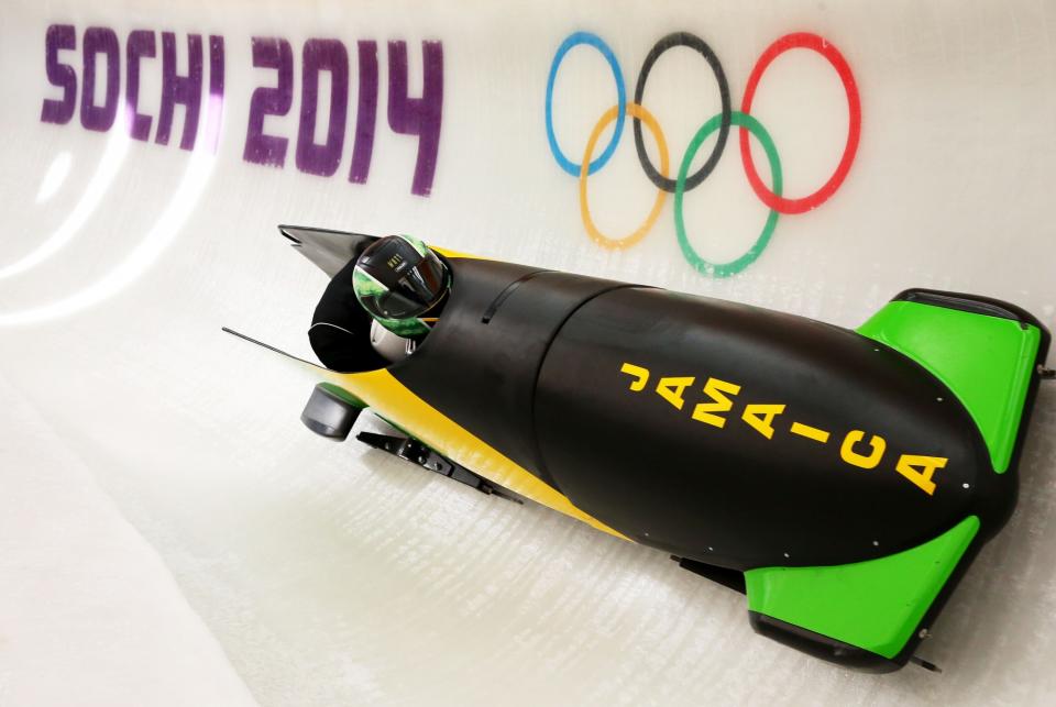 Winston Watts of Jamaica pilots a bobsleigh practice run ahead of the Sochi 2014 Winter Olympics at the Sanki Sliding Center. (Photo: Getty Images)