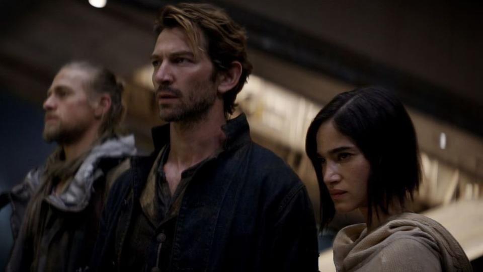 Michiel Huisman as Gunnar and Sofia Boutella as Kora in Rebel Moon - Part One: A Child of Fire